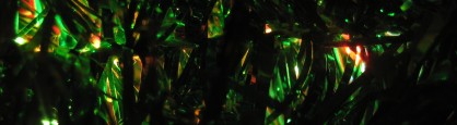 Light through the tinsel on my baby Christmas tree