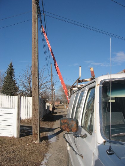 In areas where the cable comes from the poles in the alley, we sometimes have to climb up to the wire and make adjustments
