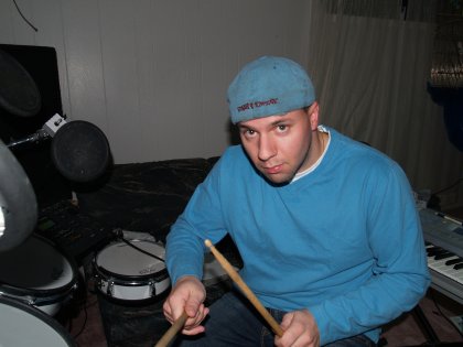 Tapping away at the dusty drums...