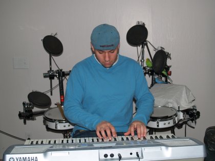 Pecking out a tune on the keyboard