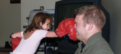 Maddy punching Bo in the face