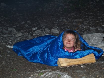 Maddy sleeping on the ground