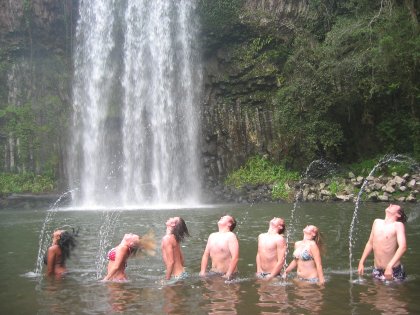 Flipping the hair in front of a famous waterfall