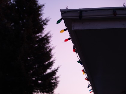 Christmas lights along the eaves trough