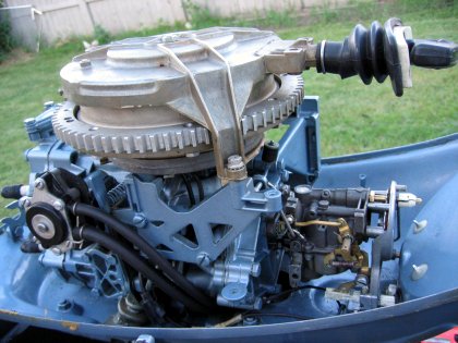 1967 Evinrude 18 HP Outboard in a barrel