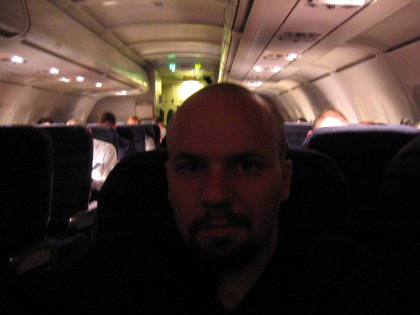 Me on an airplane at night