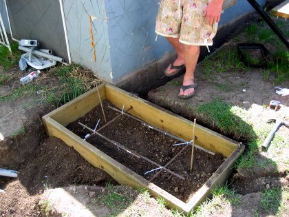 The frame for the concrete pad to be poured in the next few images