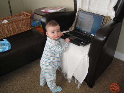 My boy playing with my computer.