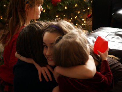 Grateful hugs given generously to cousins