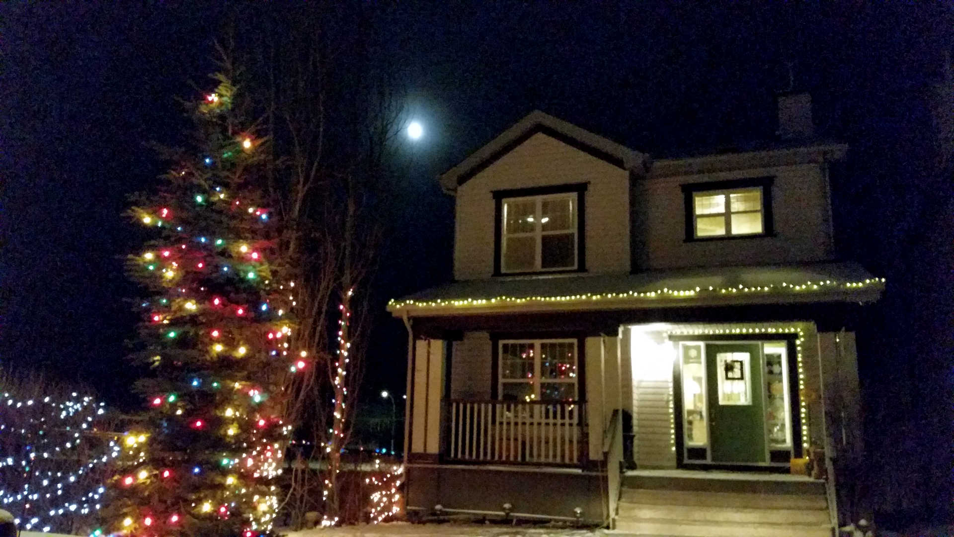 A House Lit Up With Christmas Lights